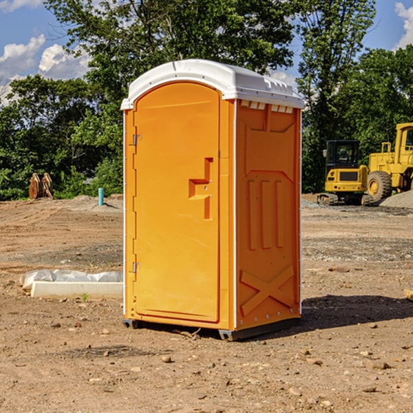 how often are the porta potties cleaned and serviced during a rental period in Hugo